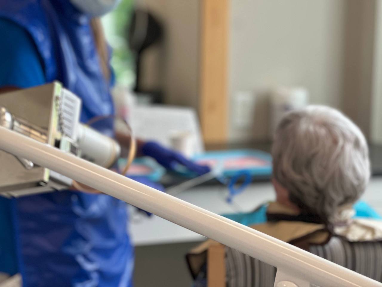 Close-up of portable X-ray equipment during a resident visit