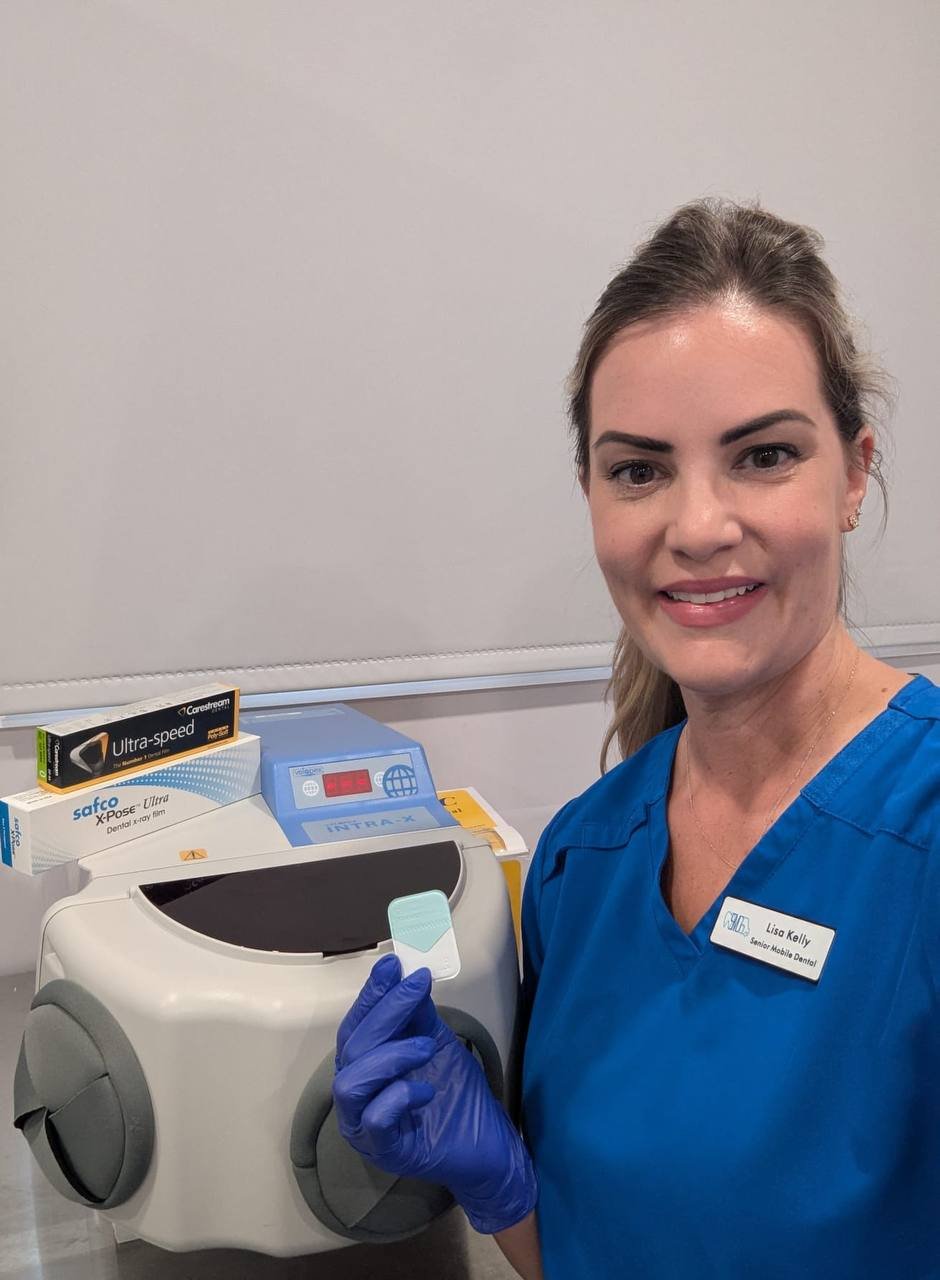 SMDS team member with portable X-ray equipment